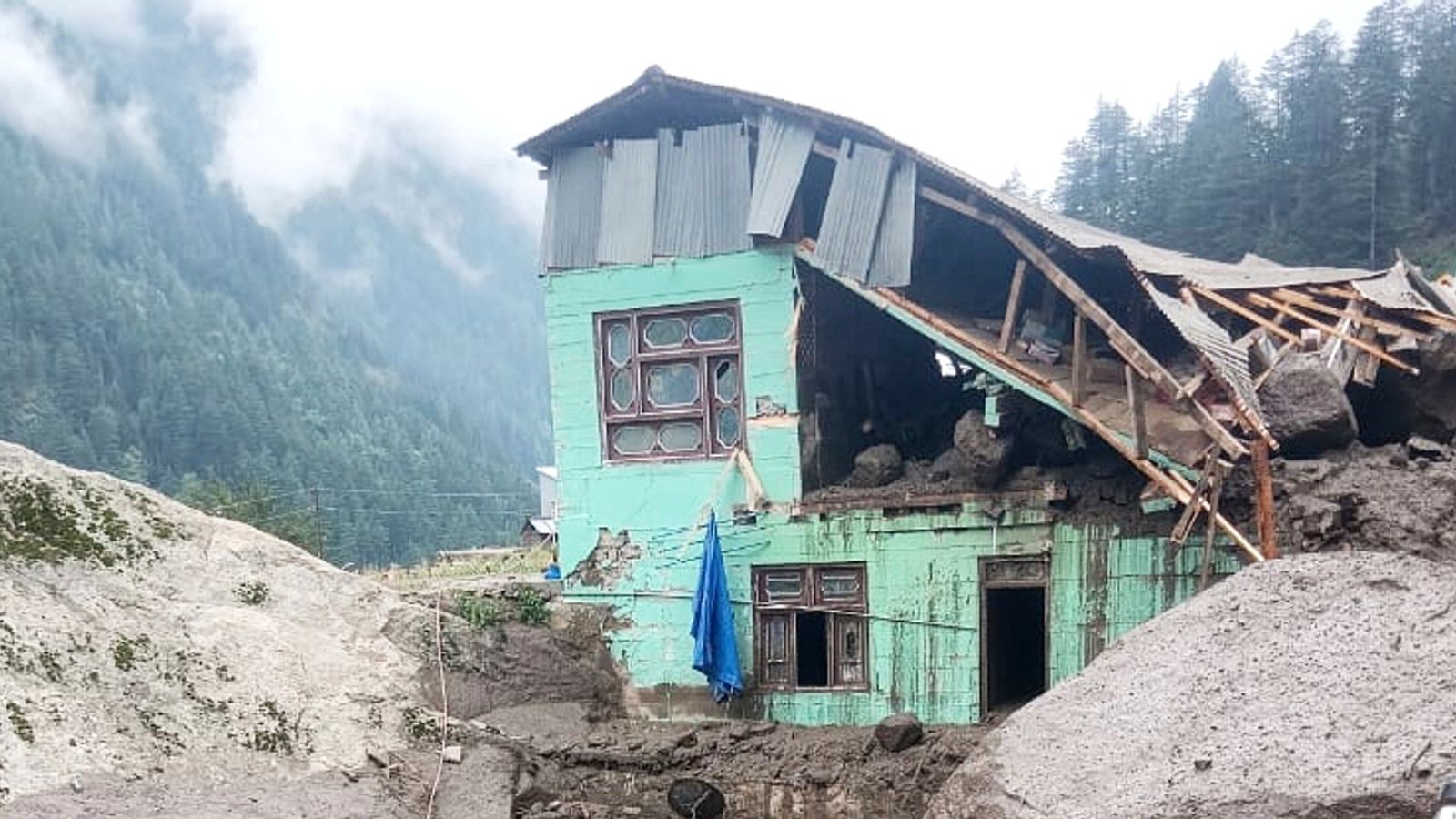 At least 56 dead and dozens missing after flash flooding in Indian Himalayas