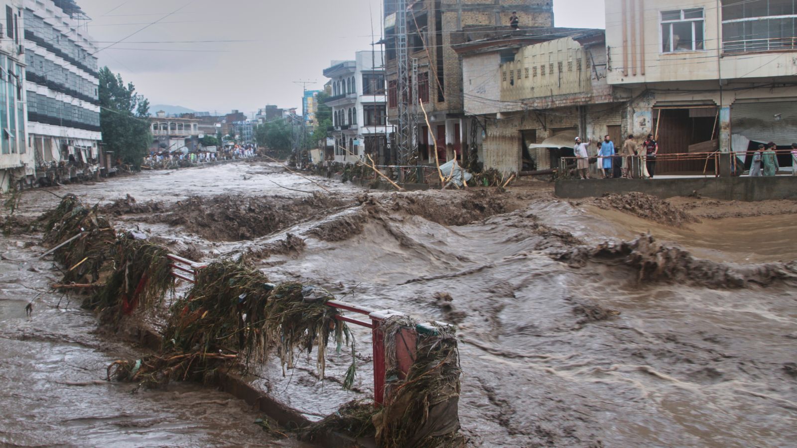 At least 224 dead after flash floods hit India and Pakistan