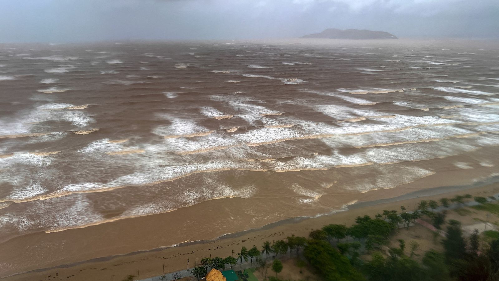 Hundreds of thousands evacuated and airports closed due to Vietnam typhoon