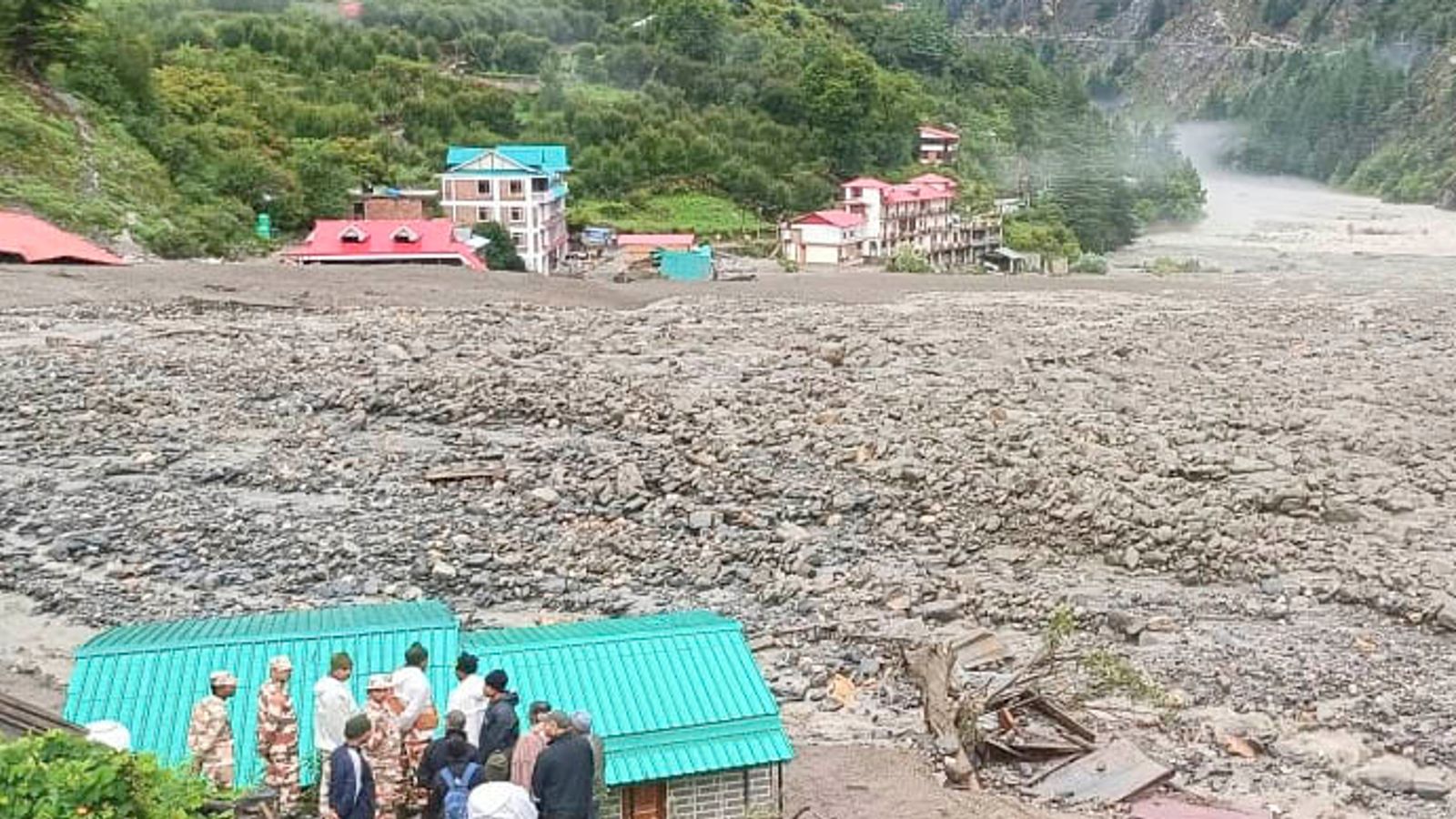 India flash floods: Dozens believed to be trapped under rubble as at least 11 soldiers reported missing