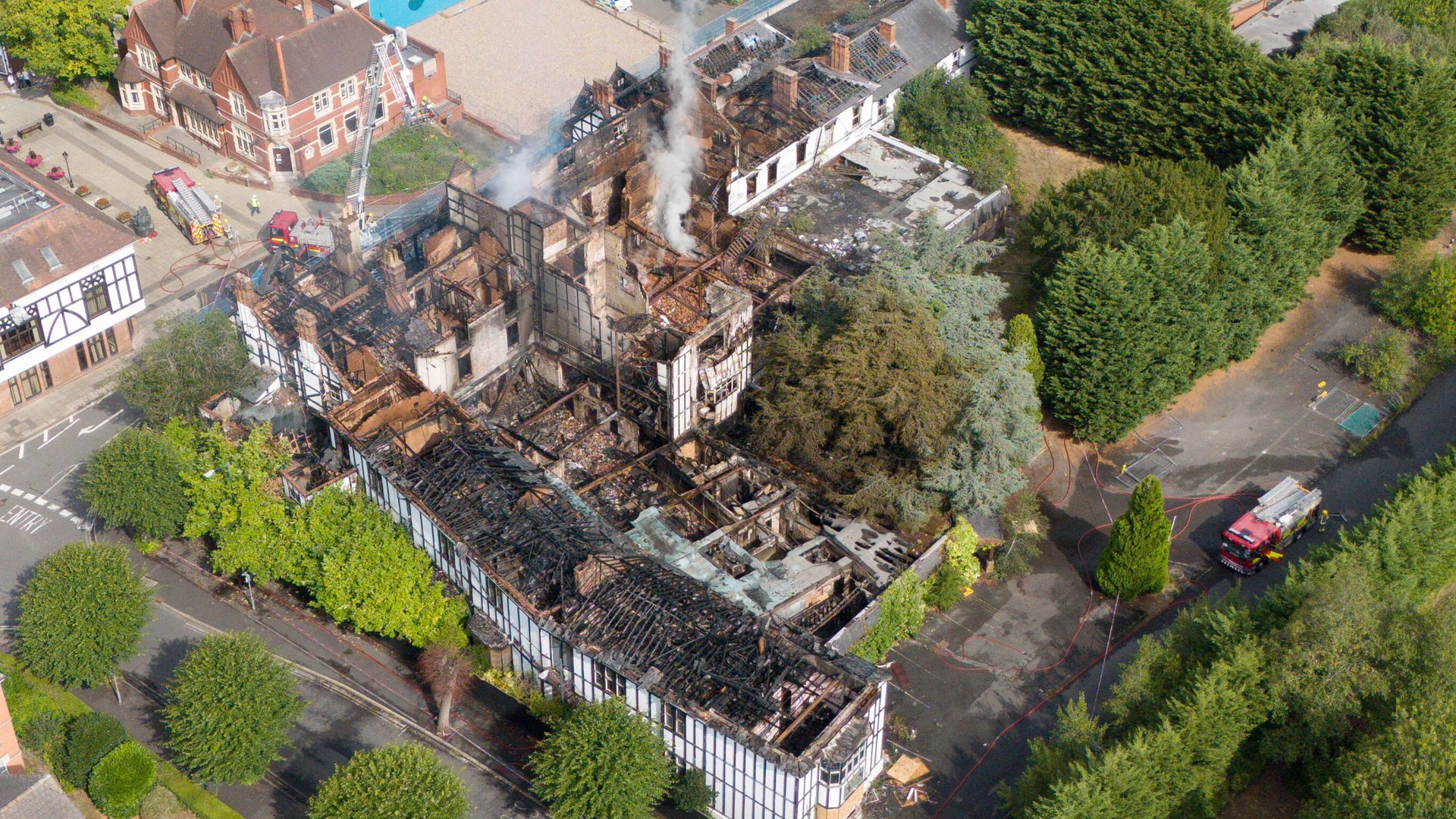 Two girls arrested after historic hotel destroyed in suspected arson attack
