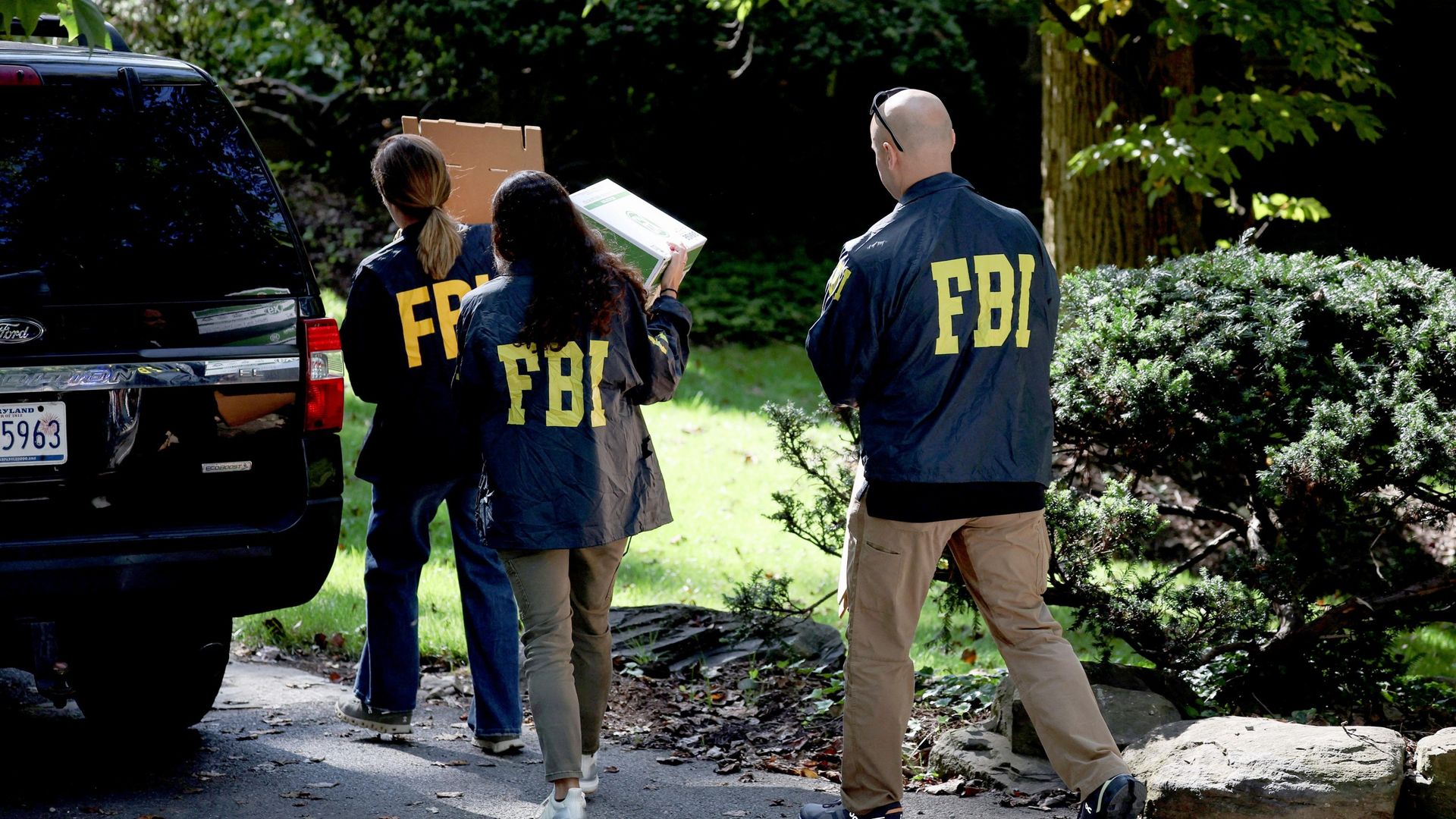 Trump critic and former adviser has home raided by the FBI