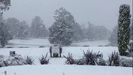 Snow blankets the grass at a Golf Club, in Armidale, New South Wales, Australia, August 2, 2025, in this screengrab obtained from social med