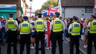 Counter protesters with police as people take part in the Stand Up To Racism rally near the TLK Apartments and Hotel in Orpington. Pic: PA