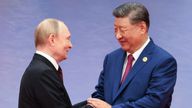 Russian President Vladimir Putin and Chinese President Xi Jinping shake hands. Pic: Alexander Kazakov, Sputnik, Kremlin Pool Photo via AP
