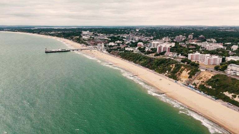 The town attracts tourists because of its long sandy beach