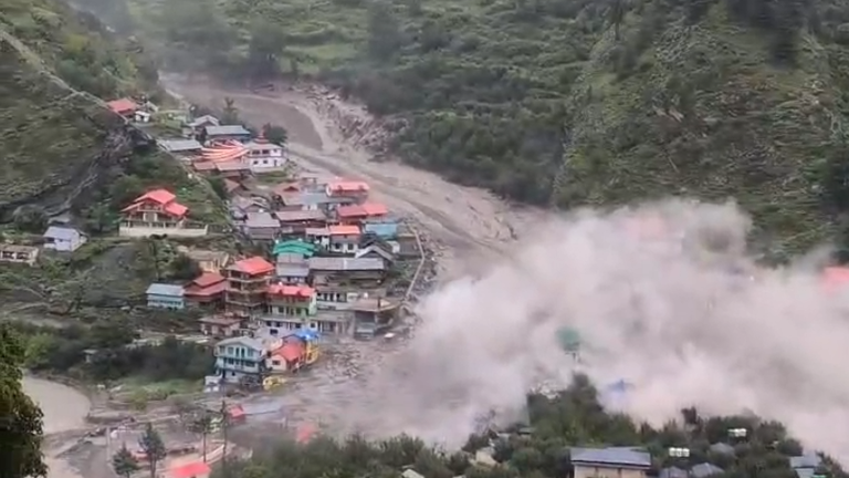 Village being hit by floodwater