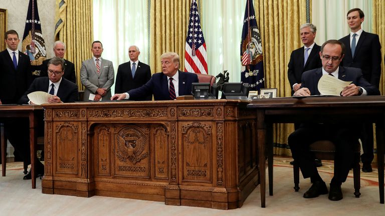 Donald Trump with Serbia's President Aleksandar Vucic (left) and Kosovo's Prime Minister Avdullah Hoti at the White House. Pic: AP