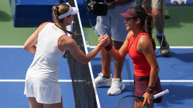 Elena Rybakina, of Kazakhstan, shakes hands with Emma Raducanu. Pic: AP