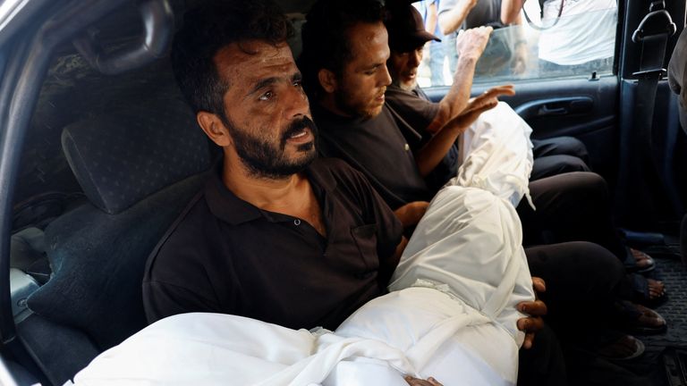 Mourners transport the body of  Ahmed Balata on 24 August. Pic: Reuters