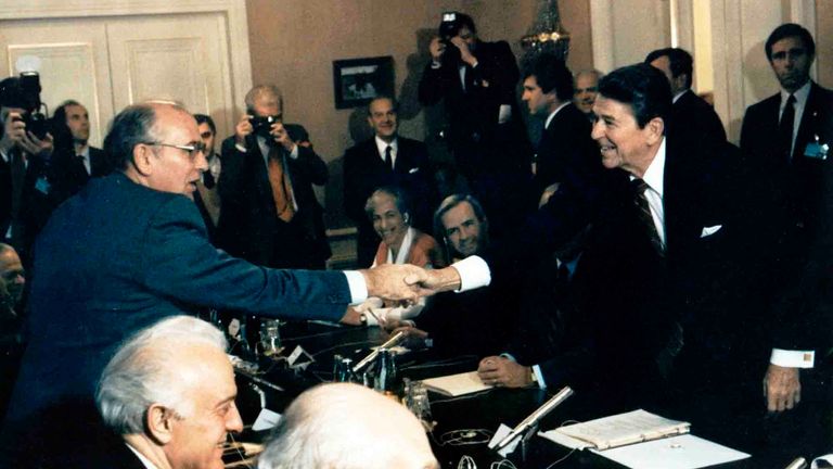 Soviet leader Mikhail Gorbachev, left, shakes hands with President Ronald Reagan at the Geneva conference in November 1985. Pic: AP