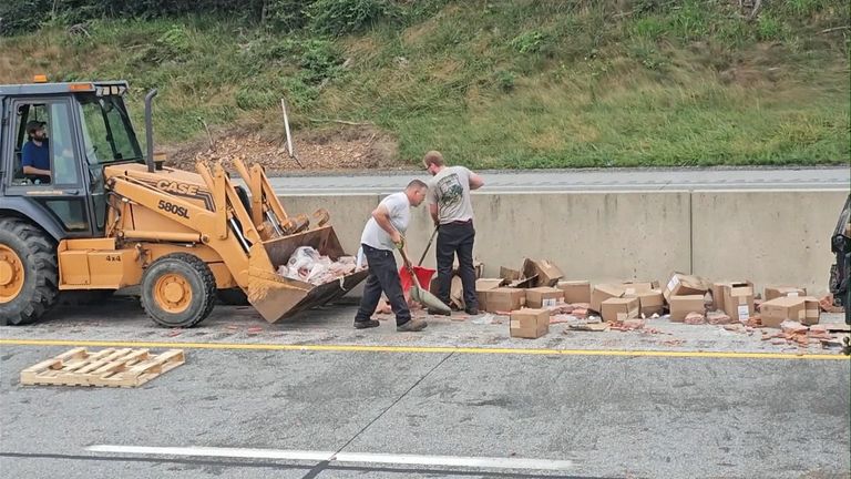 A  front-end loader was used to scoop up the hot dogs. Pic: Shrewsbury Volunteer Fire Company via AP