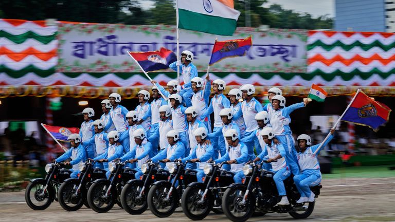 Assam Police Commandos in a motorbike formation at a parade in Guwahati. Pic: AP