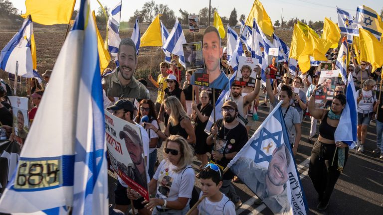Relatives and supporters of hostages held by Hamas protest in Israel. Pic: AP