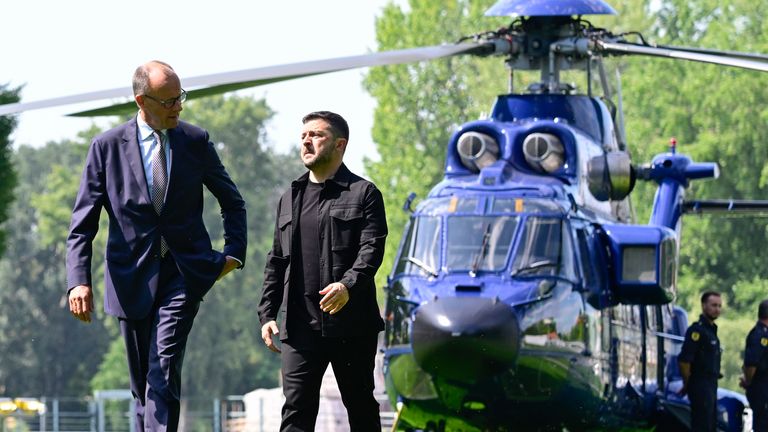 German Chancellor Friedrich Merz welcomes Ukrainian President Volodymyr Zelenskyy to Berlin. Pic: AP