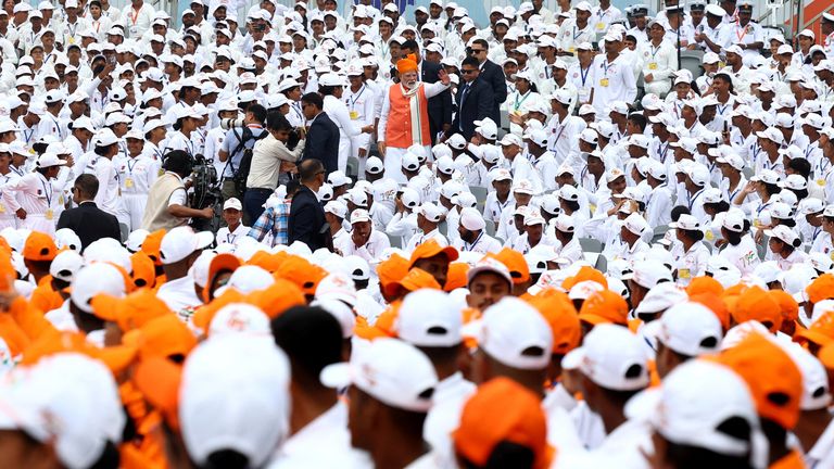 Narendra Modi (top centre) waves after his speech in Delhi. Pic: Reuters