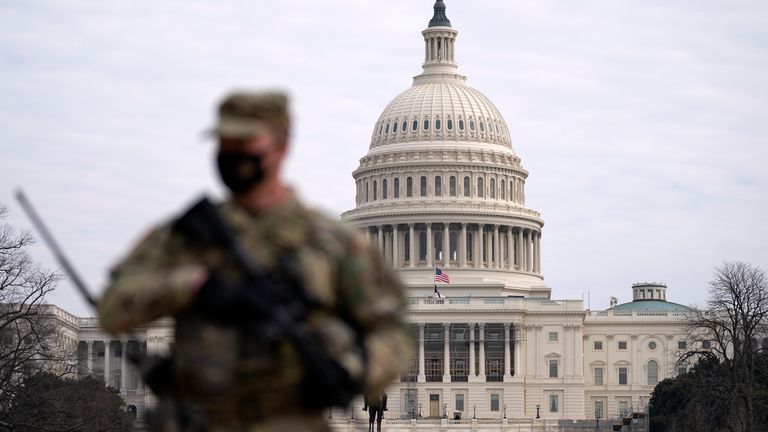 A member of the National Guard patrols the area outside of the US Capitol in 2021.
File pic: AP