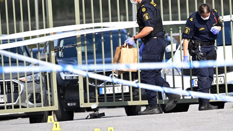 Police outside the mosque in Orebro. Pic: AP