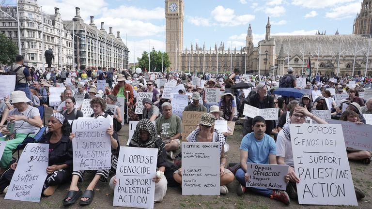 People attend the protest in central London. Pic: PA