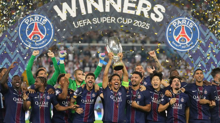 PSG's Marquinhos lifts the trophy. Pic: AP