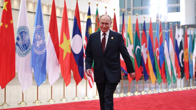 Putin arrives at a welcome ceremony for the summit. Pic: Sputnik, Kremlin pool photo via AP