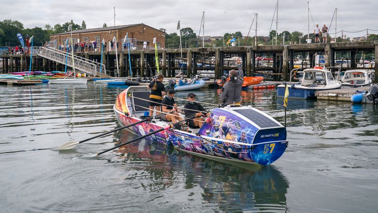 The crew of ROW4MND arriving at Port Edgar Marina in South Queensferry. Pic: PA