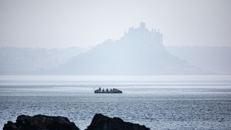 The crew leaving Newlyn Harbour in Cornwall last week after starting their challenge again. Pic: PA