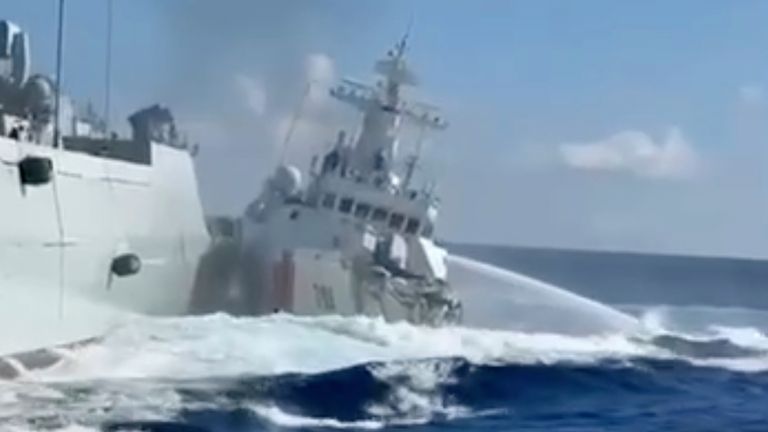 The damaged Chinese Coastguard ship, right, and the Chinese Navy vessel, left after the collision. Pic: Philippine Coastguard/AP