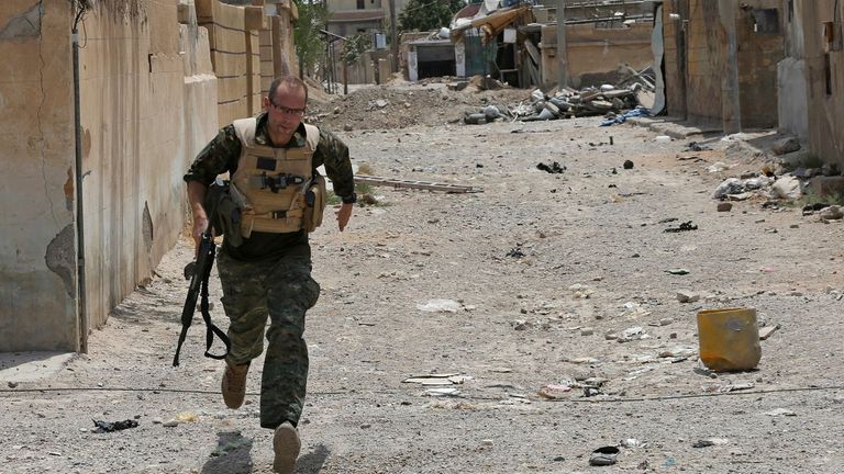 Macer Gifford fought with the Kurdish People's Protection Units (YPG) as a foreign volunteer. Pic: AP