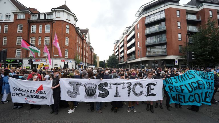 Pro-immigration protesters gather outside the Thistle City Barbican Hotel in central London, which houses asylum seekers. Pic: PA