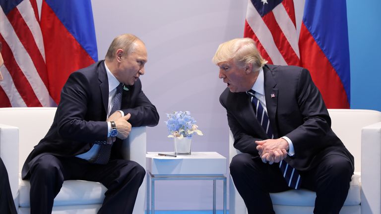 Mr Trump speaks with Mr Putin in Hamburg in 2017. Pic: Reuters