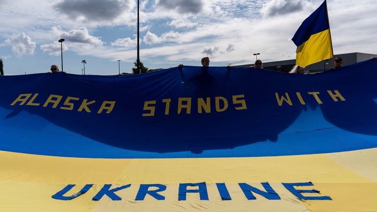 They unfurled this huge flag. AP Photo/Jae C Hong