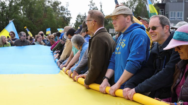 Not far from the military base, several hundred people joined a pro-Ukraine rally. Pic: Nathaniel Wilder/Reuters