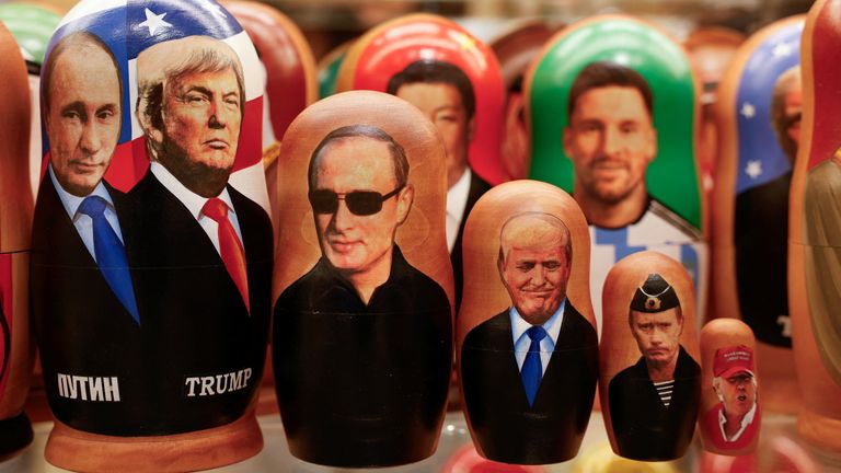 Russian traditional nesting dolls with images of Vladimir Putin and Donald Trump at a gift shop in Moscow. Pic: Reuters