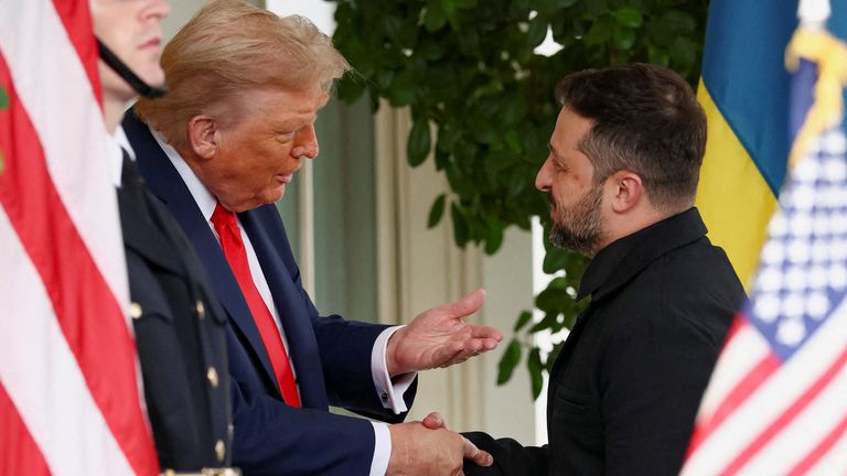 Mr Trump and Mr Zelenskyy shake hands at the White House. Pic: Reuters/Kevin Lamarque