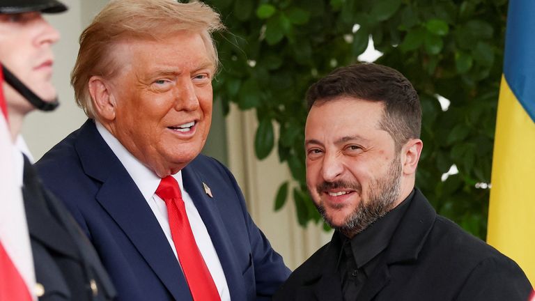 Both were seen flashing a smile. Pic: Reuters/Kevin Lamarque