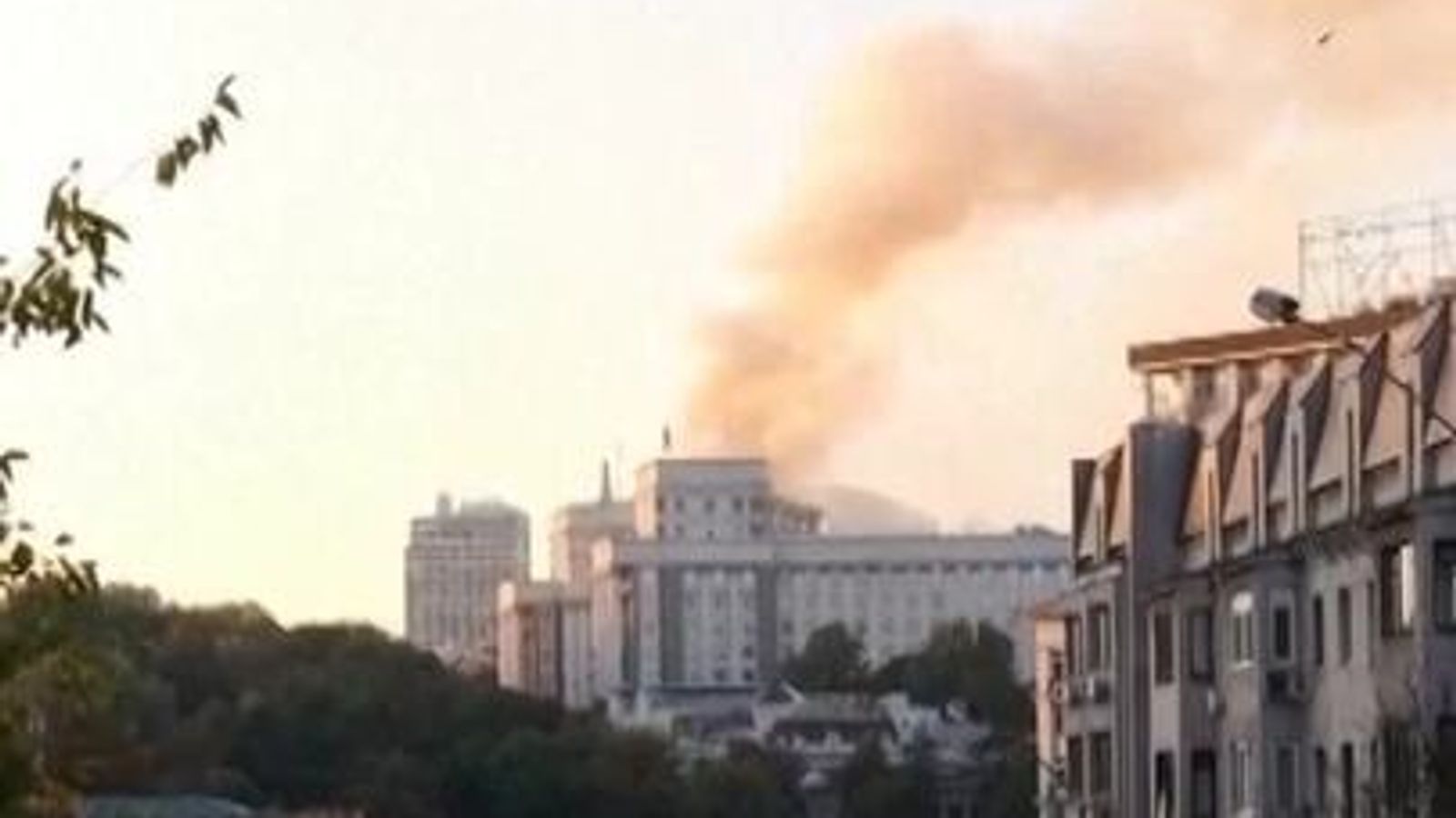 Smoke rises from Kyiv government building after Russian drone strike ...