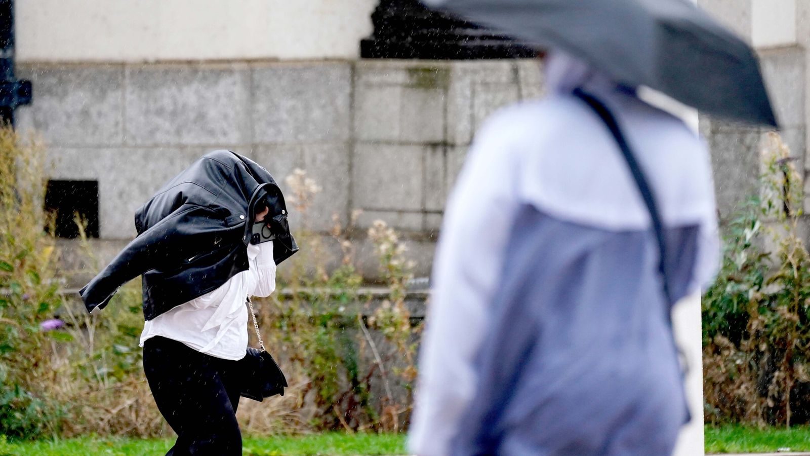 Gusts hit nearly 80mph, disrupting roads, railways and ferry services across parts of England and Wales