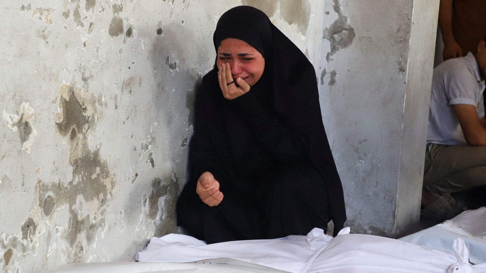 Israel kills 22 people including nine children in 'horrific massacre' in Gaza, Palestinian officials say