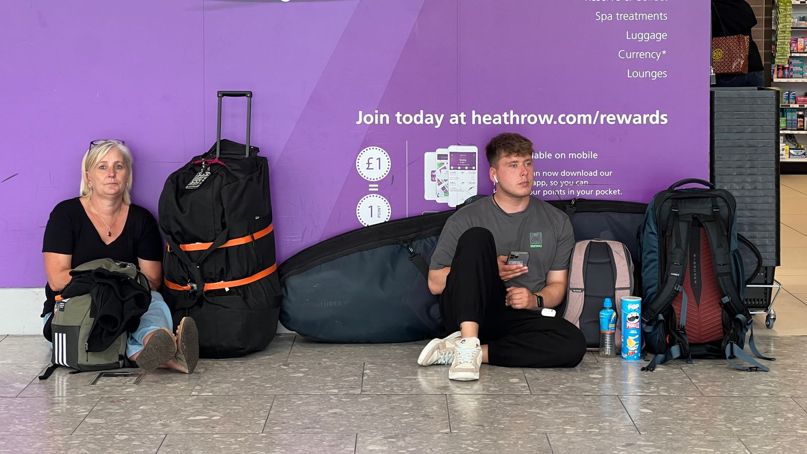 Passengers stranded by cyber attack 'shouted at' by staff despite 'insane queues' for manual check-in