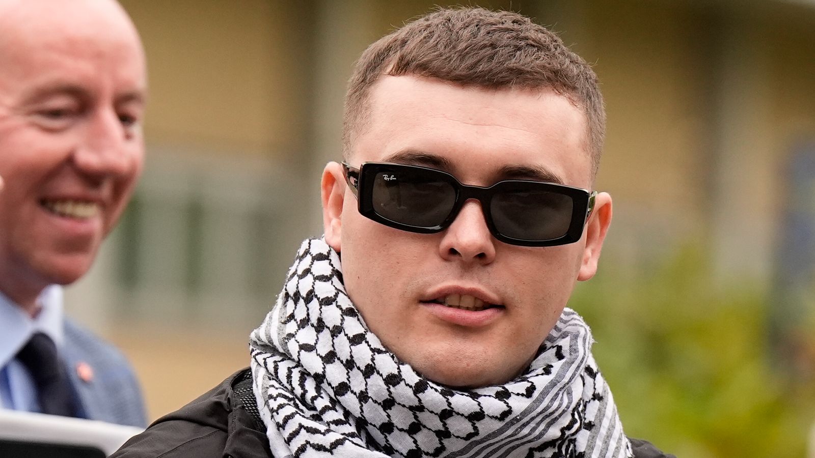 Prosecutors to appeal against decision to throw out terrorism case against Kneecap rapper