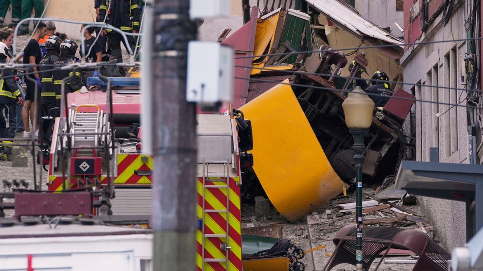At least 15 killed after Lisbon's iconic Gloria funicular derails 