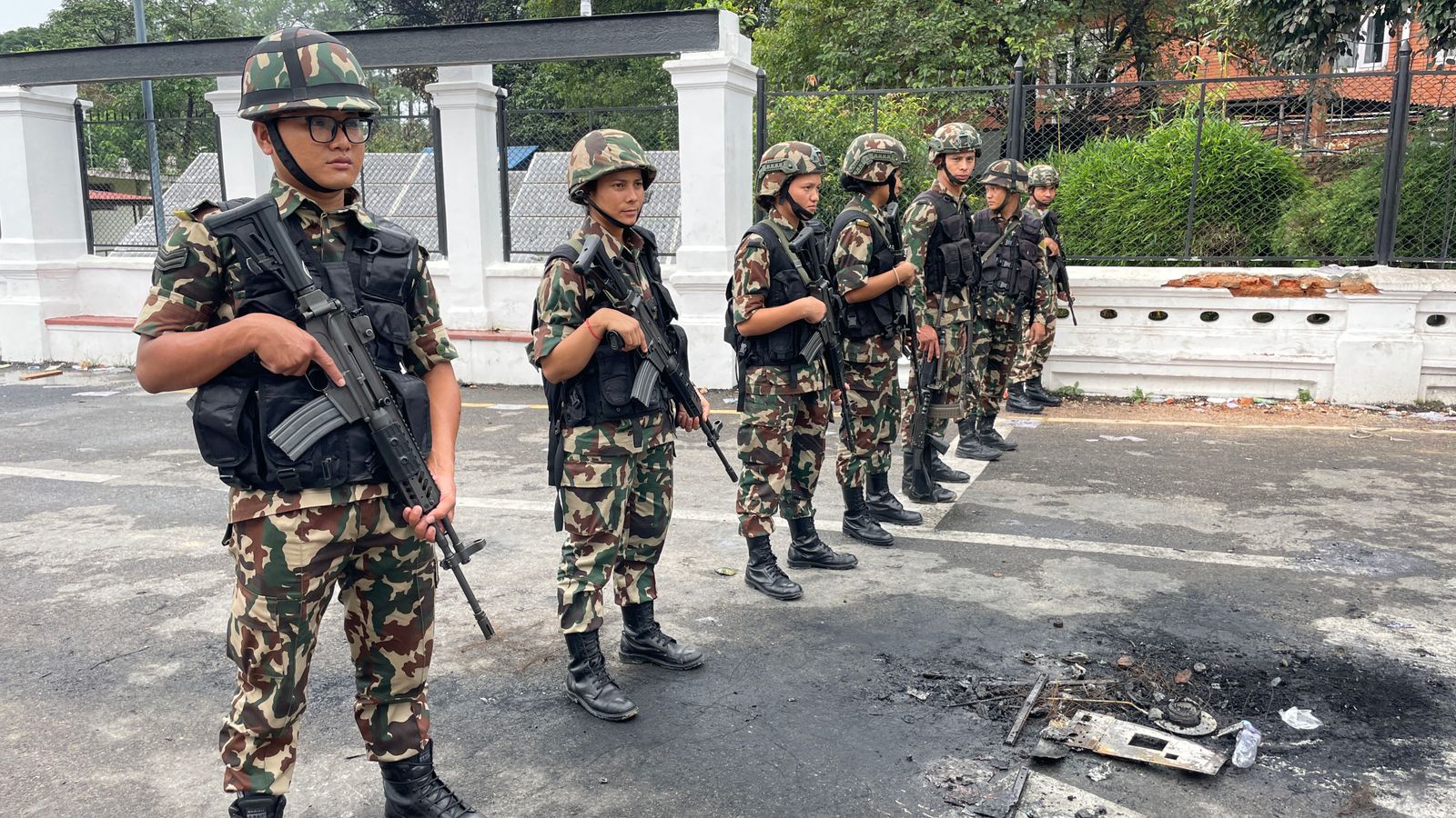 Military curfew brings an uneasy calm to Nepal’s capital after violent protests