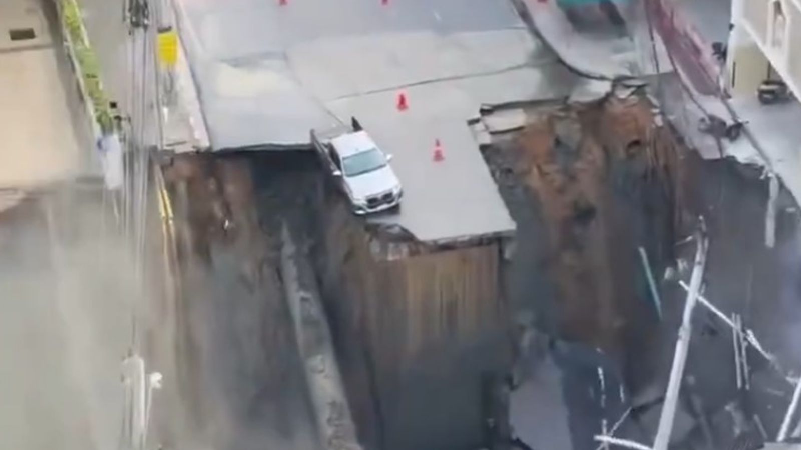 Giant sinkhole opens near hospital in Bangkok | World News | Sky News