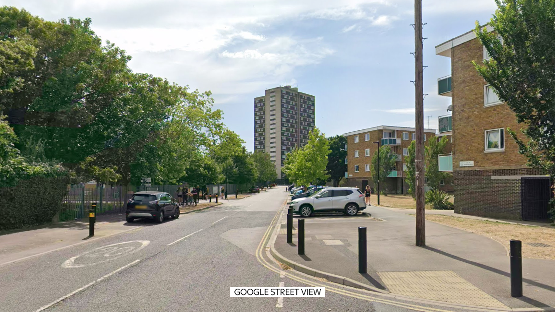 Man, 18, arrested on suspicion of murder after woman fell from block of flats