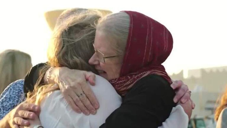 Freed couple reunited with family