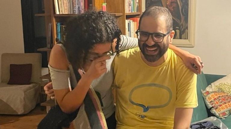 Alaa Abd El-Fattah with his sister after his release from prison. Pic: Twitter/@monasosh