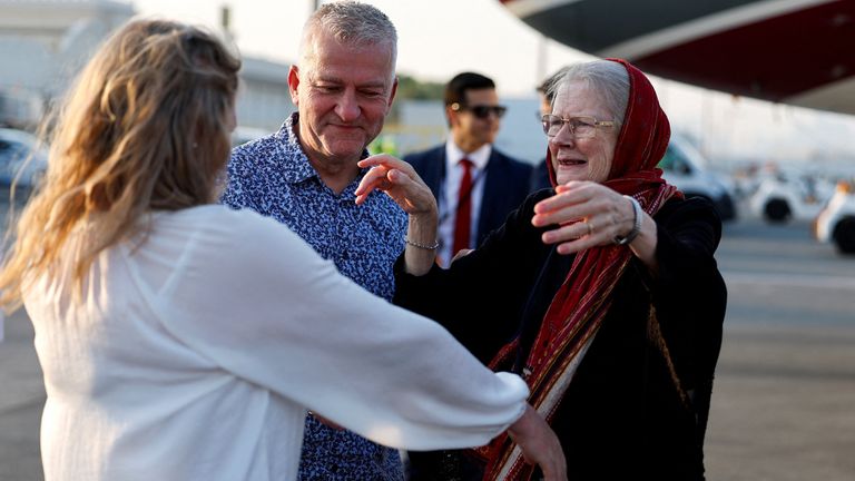 Barbie Reynolds is greeted after disembarking from a plane in Doha.
Pic: Reuters