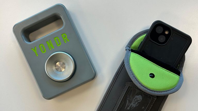 Pupils at Birchwood Community High School in Warrington place their phones in pouches, which are then locked