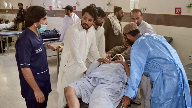 The injured were taken to hospital. Pic: AP